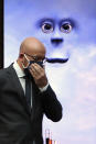 European Council President Charles Michel leaves after an online press conference with European Commission President Ursula von der Leyen and German Chancellor Angela Merkel following an EU-China virtual summit at the European Council building in Brussels, Monday, Sept. 14, 2020. Michel, Merkel and Von der Leyen had talks in a videoconference with China's President Xi Jinping. (Yves Herman/Pool Photo via AP)