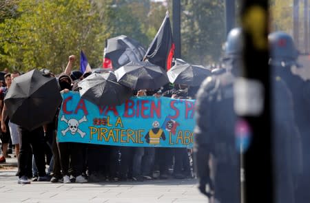 Protesters hold a banner during a demonstration on Act 44 (the 44th consecutive national protest on Saturday) of the yellow vests movement in Nantes