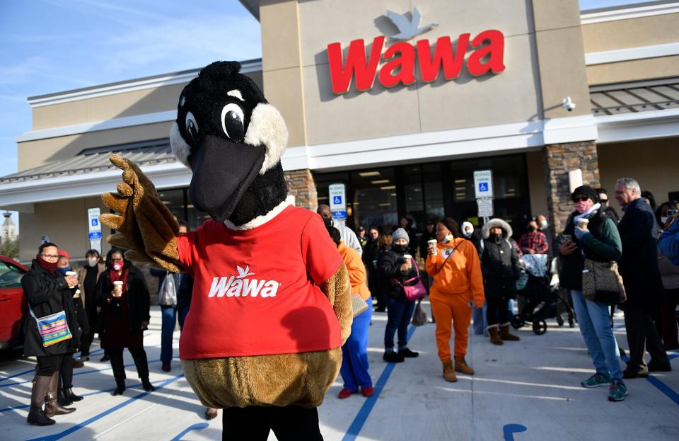 Wally Goose greets customers at the new Wawa in Bridgeton during the grand opening event on Thursday, Dec. 9, 2021.