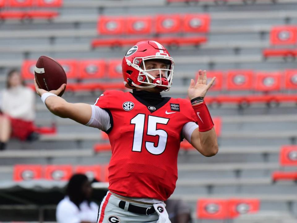 Georgia quarterback Carson Beck (15) has thrown for 1,497 yards with seven touchdowns and only two interceptions and has completed 72.1 percent of his throws.