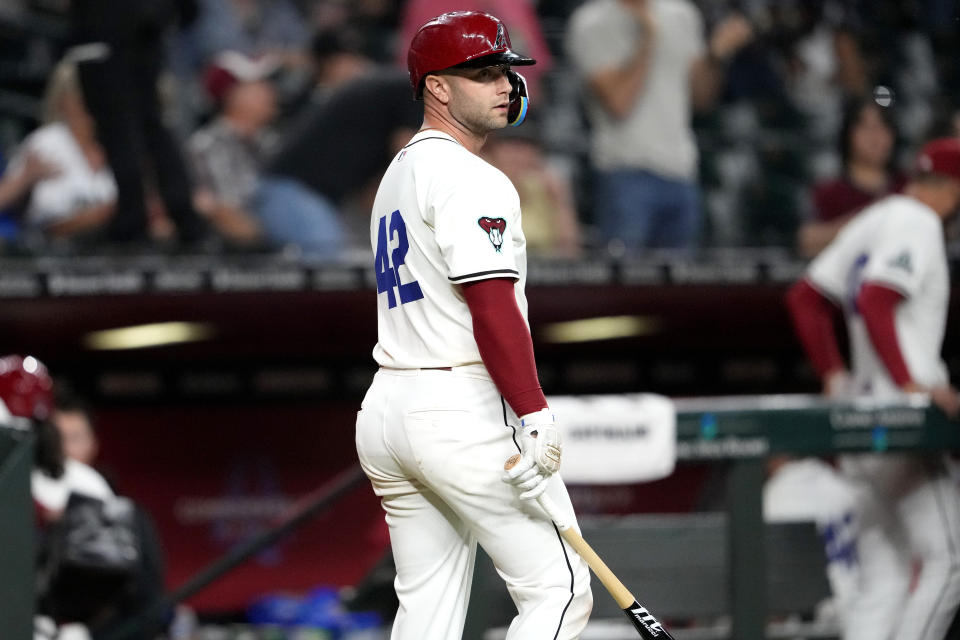 Arizona Diamondbacks' Christian Walker looks towards the mound after striking out to end the baseball game against the Chicago Cubs, Monday, April 15, 2024, in Phoenix. The Cubs defeated the Diamondbacks 3-2. (AP Photo/Matt York)