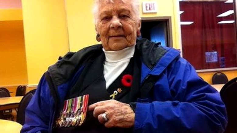 Madrien Ferris proudly displays her husband's service medals on the right side of her chest before attending a Remembrance Day event in Charlottetown, P.E.I.