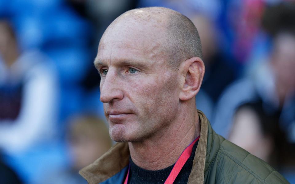 Former Wales international rugby player Gareth Thomas stands at the side of the pitch during the Premier League match between Cardiff City and Fulham FC at the Cardiff City Stadium on October 20, 2018 in Cardiff, Wales - Athena Pictures/Getty Images