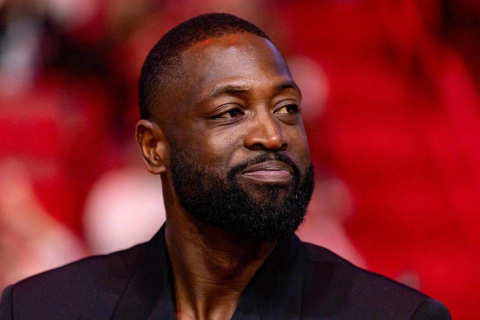 Former Miami Heat player Dwyane Wade reacts during a ceremony honoring his induction into the Naismith Basketball Hall of Fame at Kaseya Center in Miami, Florida, on Sunday, January 14, 2024.