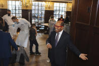 A wax statue of Al Roker welcomes diners to Peter Luger Steakhouse on Friday, Feb, 26, 2021, in New York. The statue, on loan from Madame Tussauds, will help fill out the restaurant during COVID-19 occupancy restrictions. (AP Photo/Kevin Hagen)