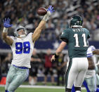 <p>Philadelphia Eagles quarterback Carson Wentz (11) throws incomplete as Dallas Cowboys defensive end Tyrone Crawford (98) tries to bat the ball down during the second quarter on Sunday, Nov. 19, 2017 at AT&T Stadium in Arlington, Texas. (Max Faulkner/Fort Worth Star-Telegram/TNS) </p>