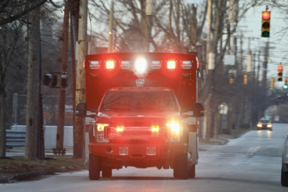 An ambulance truck with the lights turned on