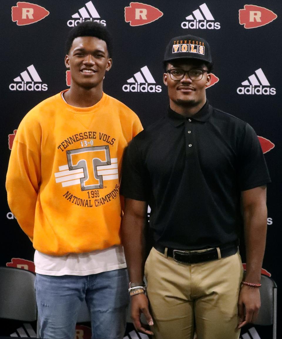 Riverdale football player Caleb Herring and brother, Riverdale football player Elijah Herring, who signed to play football with the University of Tennessee on Thursday, Dec. 16, 2021, at Riverdale, stands with his brother on his signing day.