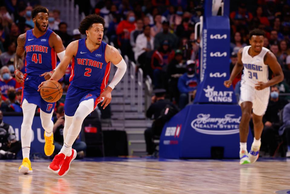 Detroit Pistons guard Cade Cunningham (2) dribbles in the first half against the Orlando Magic at Little Caesars Arena on Oct. 30, 2021.