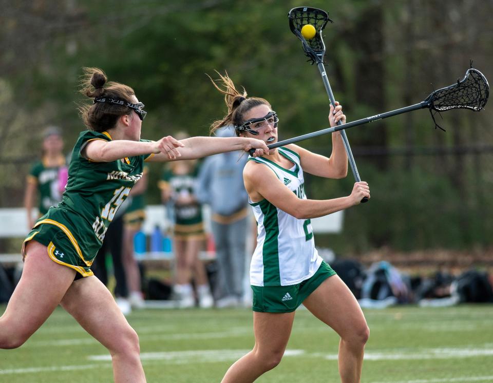 Grafton’s Caity Tyldesley takes a shot on goal past Notre Dame Academy defender Madelyn Dugan Monday, April 24, 2023.