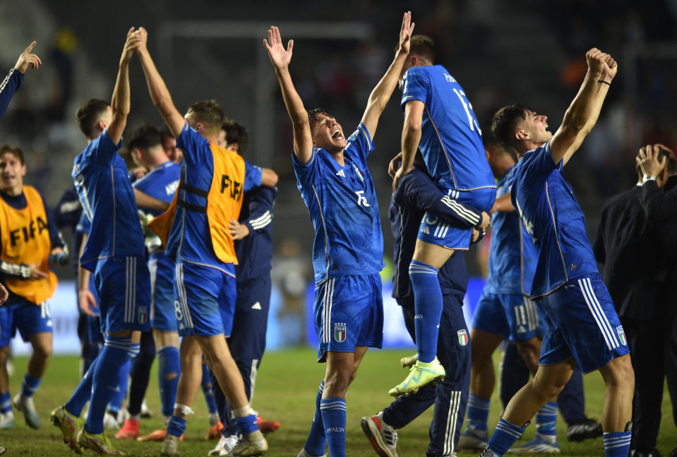Players of Italy celebrate their team's win over South Korea at the end of a FIFA U-20 World Cup semifinal soccer match at Diego Maradona stadium in La Plata, Argentina, Thursday, June 8, 2023. (AP Photo/Gustavo Garello)