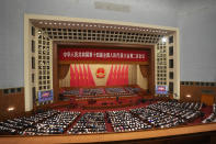 Delegates attend the second plenary session meeting of the National People's Congress (NPC) in the Great Hall of the People in Beijing, China, Friday, March 8, 2024. (AP Photo/Tatan Syuflana).