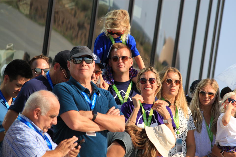Members of Richard Branson's family and friends watch as the Virgin Galactic mothership and rocket plane gain speed as it moves down the runway of Spaceport America near Truth or Consequences, New Mexico, on July 11, 2021. Branson and five crewmates reached an altitude of about 53 miles (88 kilometers) over the New Mexico desert — enough to experience three to four minutes of weightlessness and see the curvature of the Earth. (AP Photo/Susan Montoya Bryan)