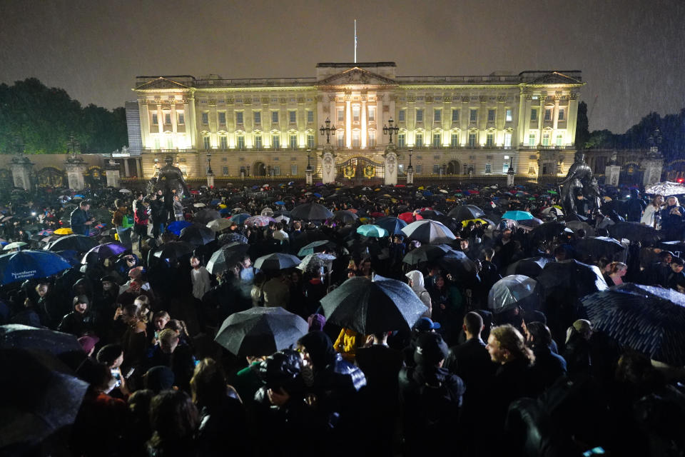 Members of the public gather outside Buckingham Palace in central London, following the announcement of the death of Queen Elizabeth II. Picture date: Thursday September 8, 2022. (Photo by Victoria Jones/PA Images via Getty Images)