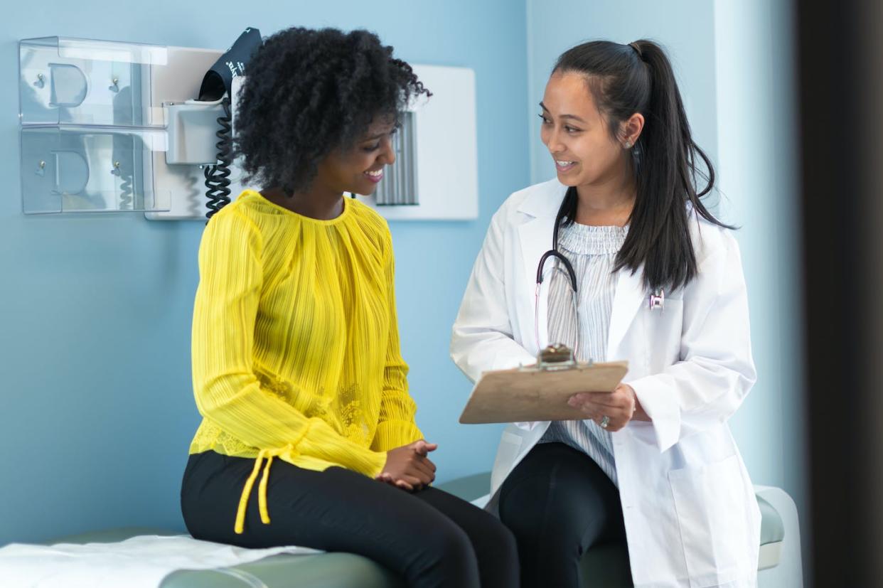 Creating a safe space for patients to ask questions and provide fully informed consent could help increase clinical trial recruitment. <a href="https://www.gettyimages.com/detail/photo/ethnic-woman-in-medical-consultation-with-female-royalty-free-image/1168998661" rel="nofollow noopener" target="_blank" data-ylk="slk:FatCamera/E+ via Getty Images;elm:context_link;itc:0;sec:content-canvas" class="link ">FatCamera/E+ via Getty Images</a>