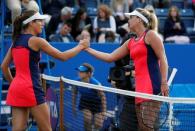 Tennis - WTA Premier - Aegon Classic - Edgbaston Priory Club, Birmingham, Britain - June 22, 2017 USA's CoCo Vandeweghe shakes the hand of Great Britain's Johanna Konta as she celebrates winning her second round match Action Images via Reuters/Peter Cziborra