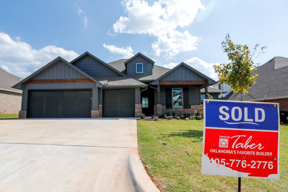 A home is marked as sold Tuesday in the Highgarden neighborhood in Edmond.