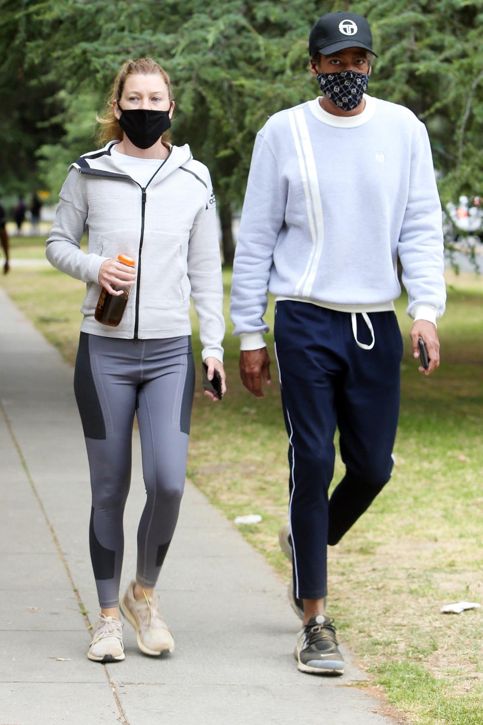 <p>Ellen Pompeo and husband Chris Ivery take an afternoon hike on Tuesday in Los Angeles. </p>