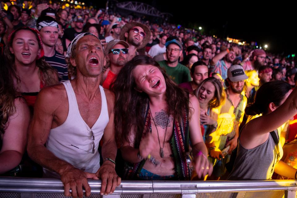 Fans react as Phish performs at the Bonnaroo Music and Arts Festival in Manchester, Tenn., Sunday, June 16, 2019.