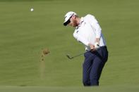 Sebastian Soderberg of Sweden plays a shot on 10th hole during the final round of Abu Dhabi HSBC Golf Championship, in Abu Dhabi, United Arab Emirates, Sunday, Jan. 22, 2023. (AP Photo/Kamran Jebreili)