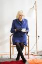 <p>Camilla visited Maggie's Centre, an organization she supports which provides emotional support for people affected by cancer. For this meeting, Camilla chose a blue skirt suit, paired with black gloves, a colorful brooch, and black, suede boots. </p>