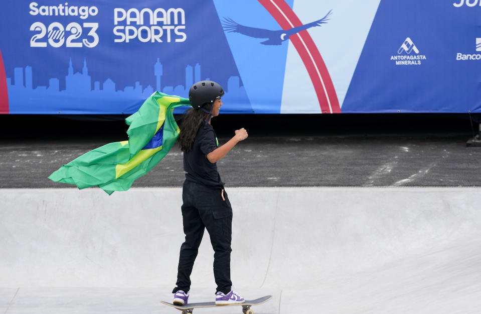 Brazil's Rayssa Leal celebrates winning the women's skateboarding street final at the Pan American Games in Santiago, Chile, Saturday, Oct. 21, 2023. (AP Photo/Esteban Felix)