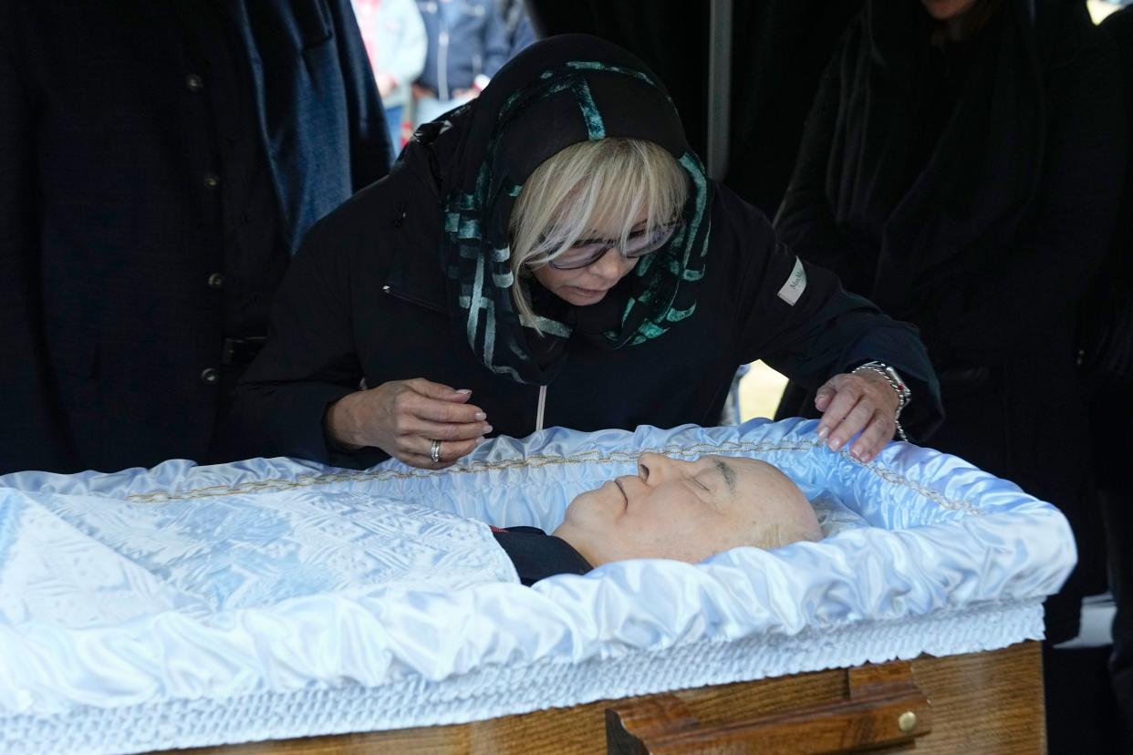 Irina Virganskaya, daughter of former Soviet Union President Mikhail Gorbachev says goodbye to him for the last time, during his funeral, at Novodevichy Cemetery in Moscow, Russia, Saturday, Sept. 3, 2022. 