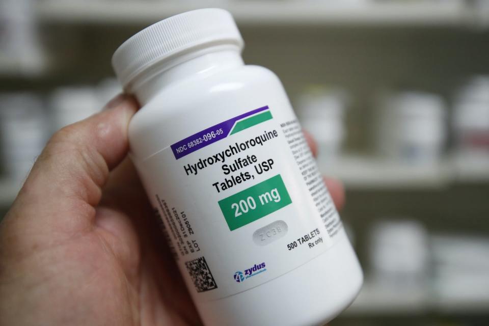 <span class="caption">President Trump touted hydroxychloroquine as a possible treatment for the novel coronavirus.</span> <span class="attribution"><a class="link " href="https://www.gettyimages.com/detail/news-photo/pharmacy-tech-holds-a-bottle-of-hydroxychloroquine-at-rock-news-photo/1214260463?adppopup=true" rel="nofollow noopener" target="_blank" data-ylk="slk:Getty Images/George Frey;elm:context_link;itc:0;sec:content-canvas">Getty Images/George Frey</a></span>