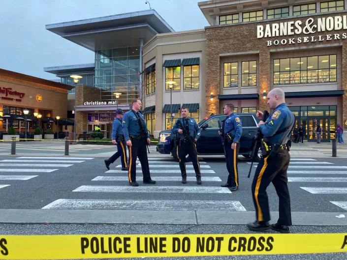 Police stood outside Christiana Mall for an apparent shooting on April 8, 2023.