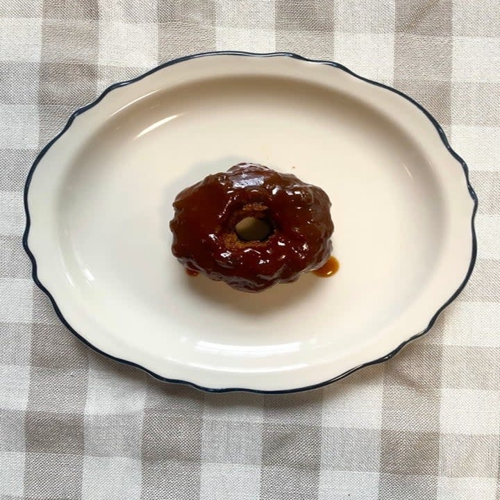 a baked pumpkin sticky toffee cake on a plate