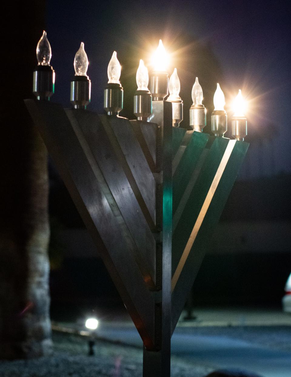 The menorah at Temple Isaiah in Palm Springs, Calif., is lit on the first night of Hanukkah on November 28, 2021.