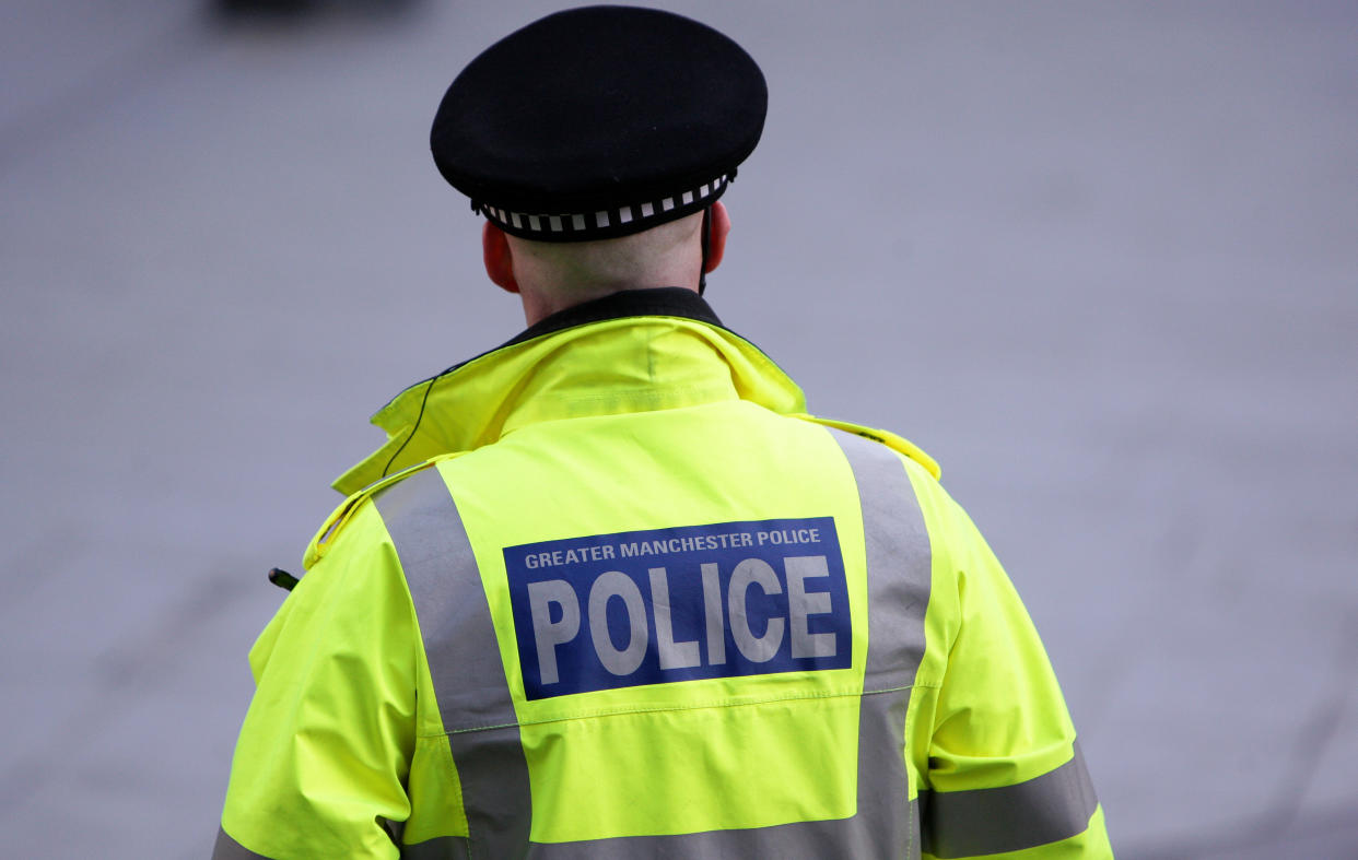 A police officer from Greater Manchester Police on duty in the city centre.