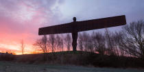 <p>Sunrise at the Angel of the North in Gateshead, England. Tomorrow marks the 20th anniversary since the iconic Antony Gormley statue was installed in the north east of England costing £800,000 at the time. (Tom White/Getty Images) </p>