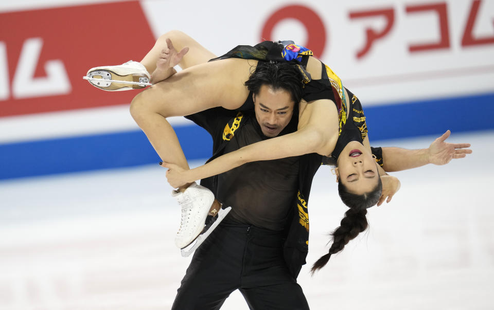Kana Muramoto and Daisuke Takahashi, of Japan, perform in the ice dance rhythm dance program at the Four Continents Figure Skating Championships on Friday, Feb. 10, 2023, in Colorado Springs, Colo. (AP Photo/David Zalubowski)