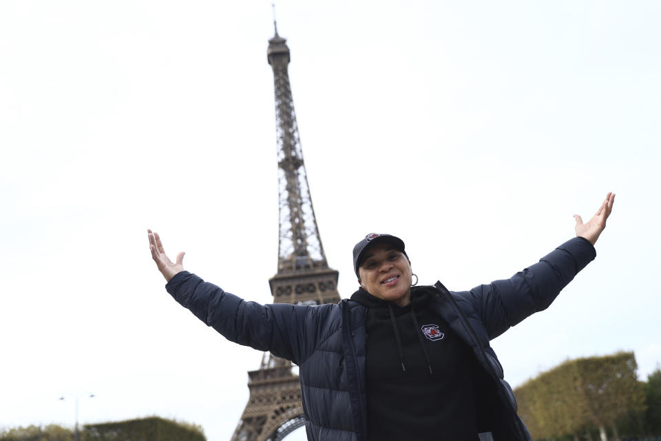 South Carolina college basketball head coach Dawn Staley poses in front of the Eiffel Tower, Thursday Nov. 2, 2023 in Paris. Notre Dame will face South Carolina in a NCAA college basketball game Monday Nov. 6 in Paris. (AP Photo/Aurelien Morissard)