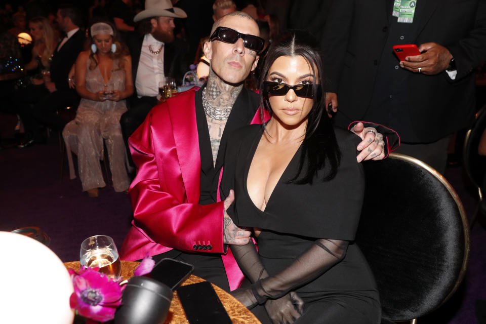 LAS VEGAS, NEVADA - APRIL 03: (L-R) Travis Barker and Kourtney Kardashian toast to the 64th Annual GRAMMY Awards with Grey Goose vodka on April 03, 2022 in Las Vegas, Nevada. (Photo by Jerod Harris/Getty Images for The Recording Academy)