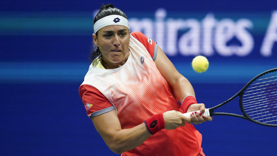 Ons Jabeur, of Tunisia, returns a shot to Ajla Tomljanovic, of Austrailia, during the quarterfinals of the U.S. Open tennis championships, Tuesday, Sept. 6, 2022, in New York. (AP Photo/Julia Nikhinson)