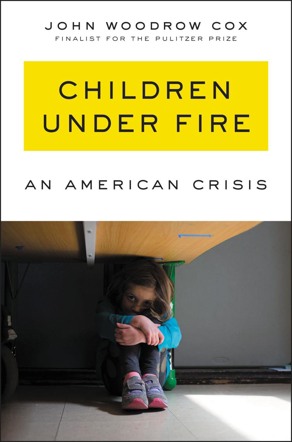 The book cover of John Woodrow Cox's new novel, "CHILDREN UNDER FIRE: An American Crisis," released March 30, 2021. (Photo courtesy of Ecco)