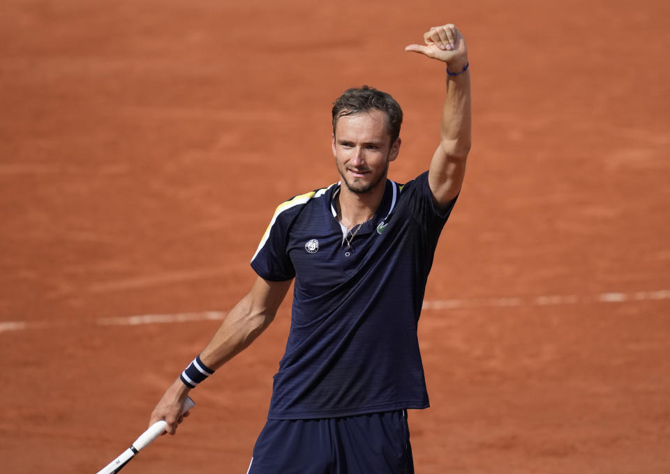 Russia's Daniil Medvedev celebrates after defeating Chile's Cristian Garin during their fourth round match on day 8, of the French Open tennis tournament at Roland Garros in Paris, France, Sunday, June 6, 2021. (AP Photo/Christophe Ena)