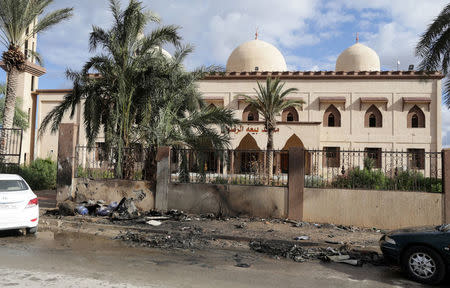Damaged mosque walls are seen near the site of twin car bombs in Benghazi, Libya, January 24, 2018. REUTERS/Esam Omran Al-Fetori