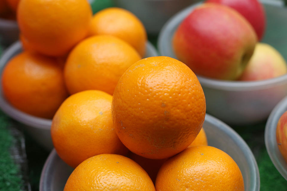 Oranges for sale on a stall in Berwick Street market, London.