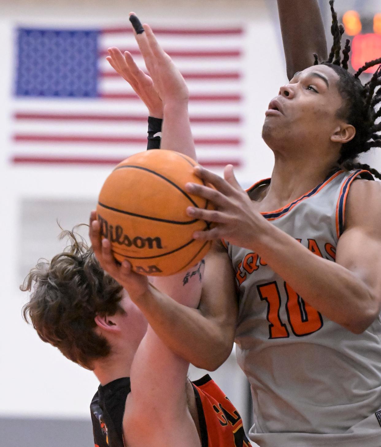 College of the Sequoias' Jose Cuello goes up for two points against Columbia in a Central Valley Conference junior college men’s basketball game on Wednesday, January 4, 2023. 