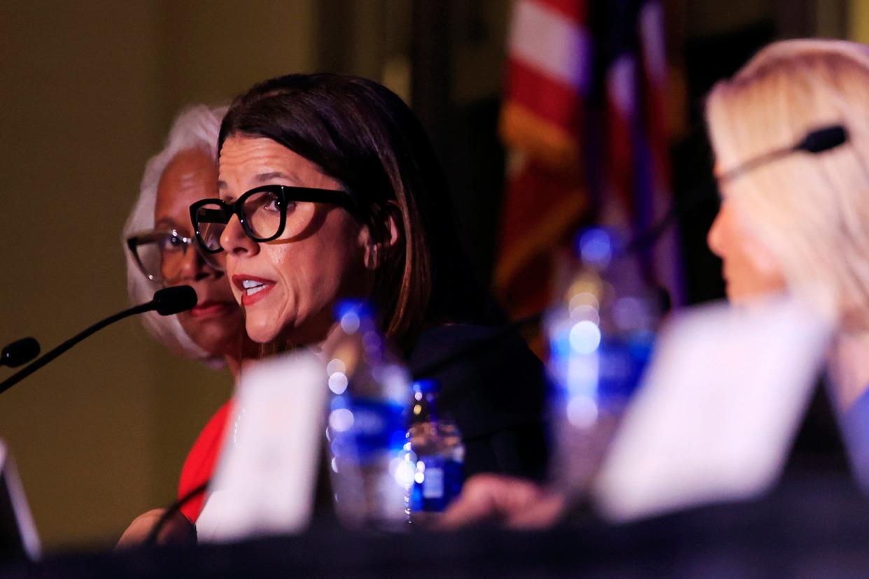 Jacksonville City Council member LeAnna Cumber, at right, speaks during a Rotary Club of Jacksonville forum for mayoral candidates.