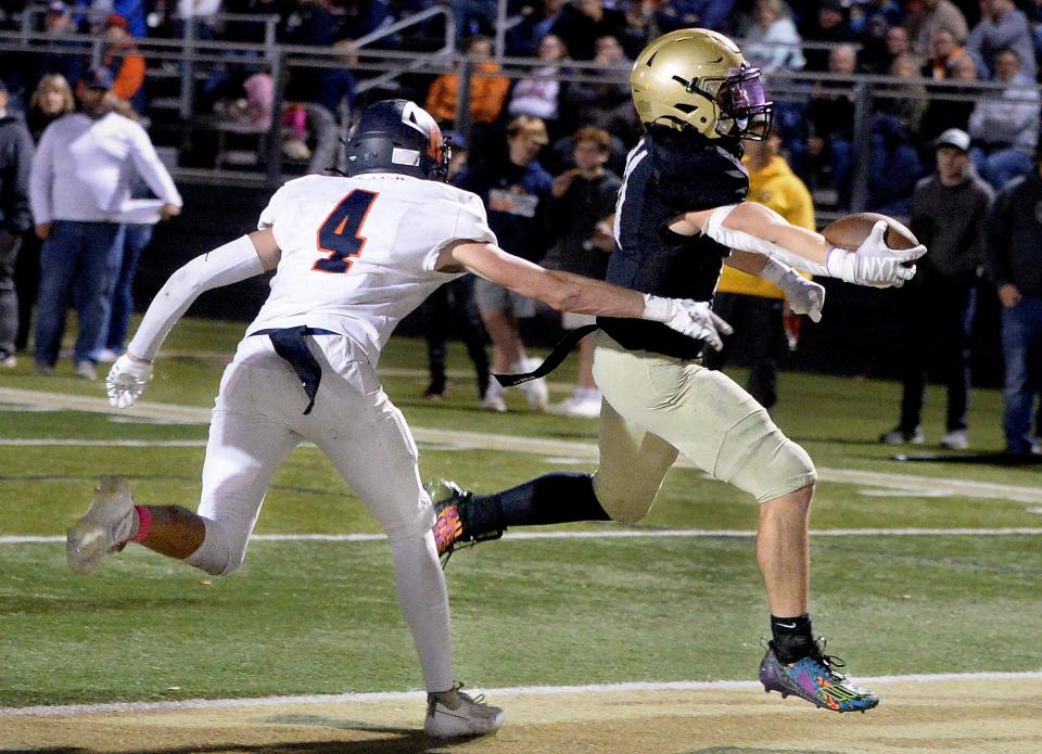 Sacred Heart-Griffin's Ethan Hagele scores a touchdown during the game against Rochester Friday, Oct. 20, 2023.