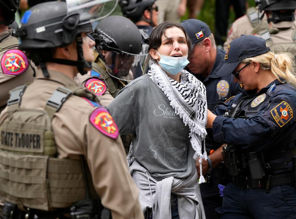 University of Texas student Arwyn Heilrayne is arrested at a pro-Palestinian protest at UT on Wednesday, April 24, 2024.