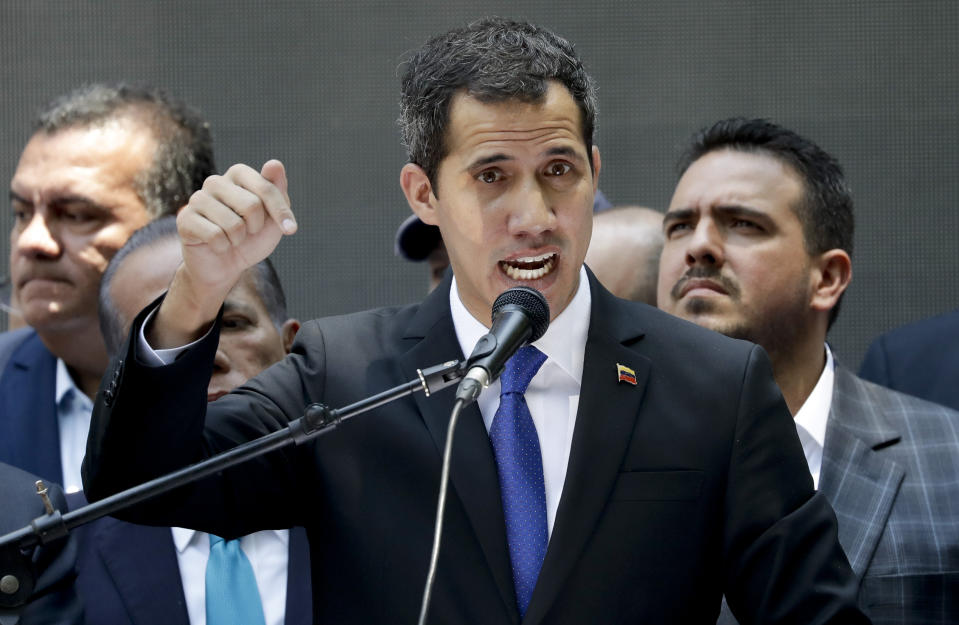 Opposition leader Juan Guaido, self-proclaimed interim president of Venezuela, talks during a meeting calling for more protests, in Caracas, Venezuela, Wednesday, March 27, 2019. (AP Photo/Natacha Pisarenko)