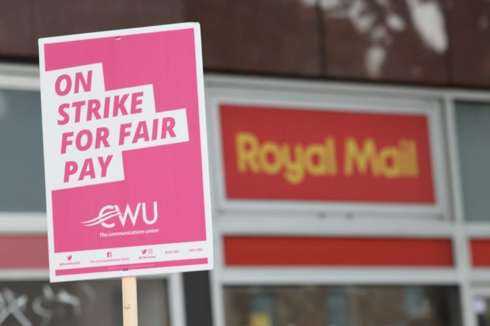 Postal workers from the Communication Workers Union on the picket line at an earlier Royal Mail strike (PA) (PA Wire)