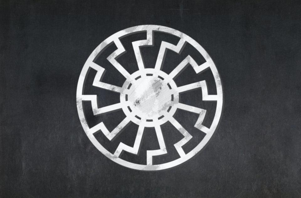 <span class="caption">The black sun symbol, embraced by some Nazis, now appears in white supremacist propaganda.</span> <span class="attribution"><a class="link " href="https://www.gettyimages.com/detail/photo/black-sun-drawn-on-a-blackboard-royalty-free-image/1089029384?adppopup=true" rel="nofollow noopener" target="_blank" data-ylk="slk:Gwengoat/iStock via Getty Images Plus">Gwengoat/iStock via Getty Images Plus</a></span>