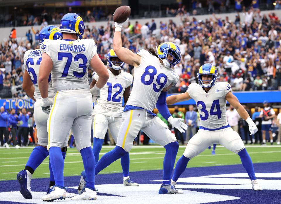 Tyler Higbee #89 of the Los Angeles Rams spikes the ball after scoring a touchdown during the second quarter in the game against the Tampa Bay Buccaneers at SoFi Stadium on September 26, 2021 in Inglewood, California.