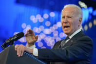President Joe Biden speaks at the U.S. Conference of Mayors' 90th Annual Winter Meeting at the Capitol Hilton in Washington, Friday, Jan. 21, 2022. (AP Photo/Andrew Harnik)